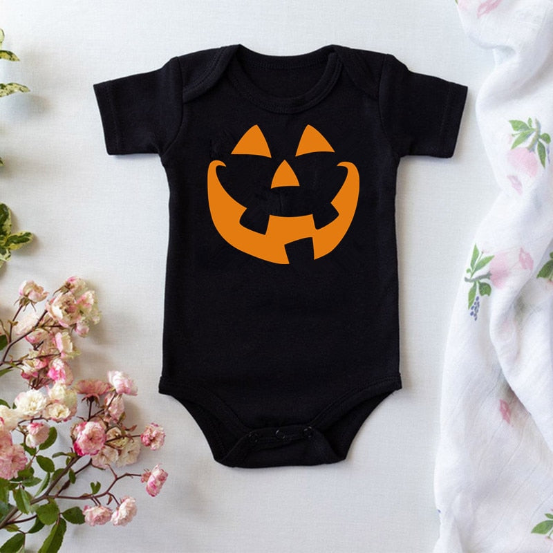 Pumpkin print on babies bodysuit