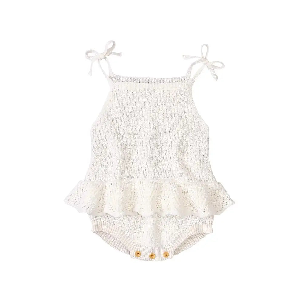 White textured baby romper with ruffled details