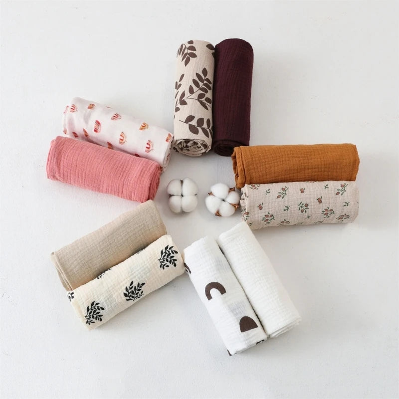 Collection of rolled-up fabrics in various colors