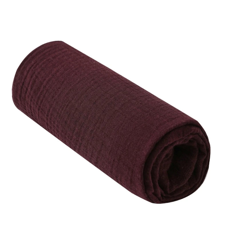 Rolled-up maroon fabric