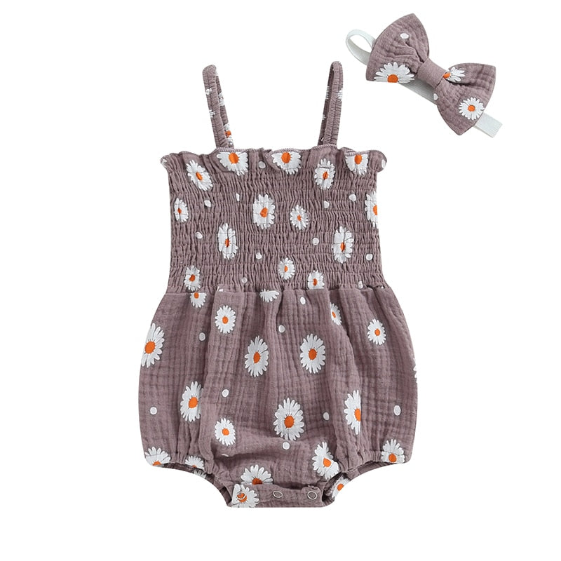 Light grey colored romper with daisy print