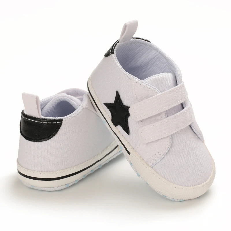 White colored canvas baby boy shoe with black star