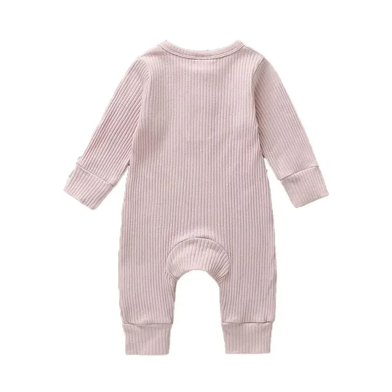 Soft pink baby girl romper suit