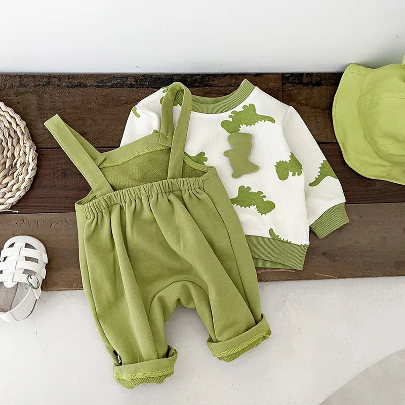 Lovely dinosaur green dungaree's with matching green jumoer