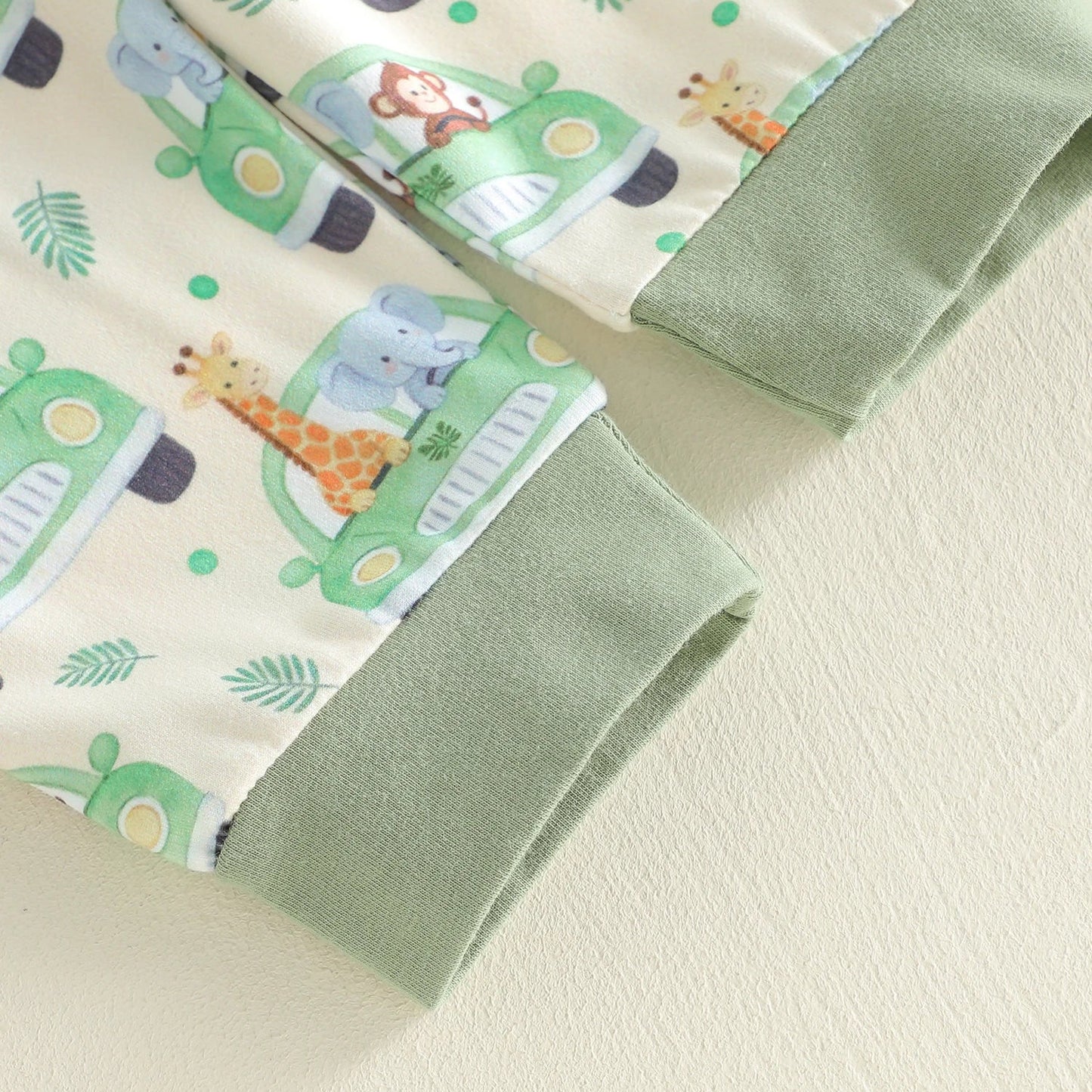Green fabric with animal print