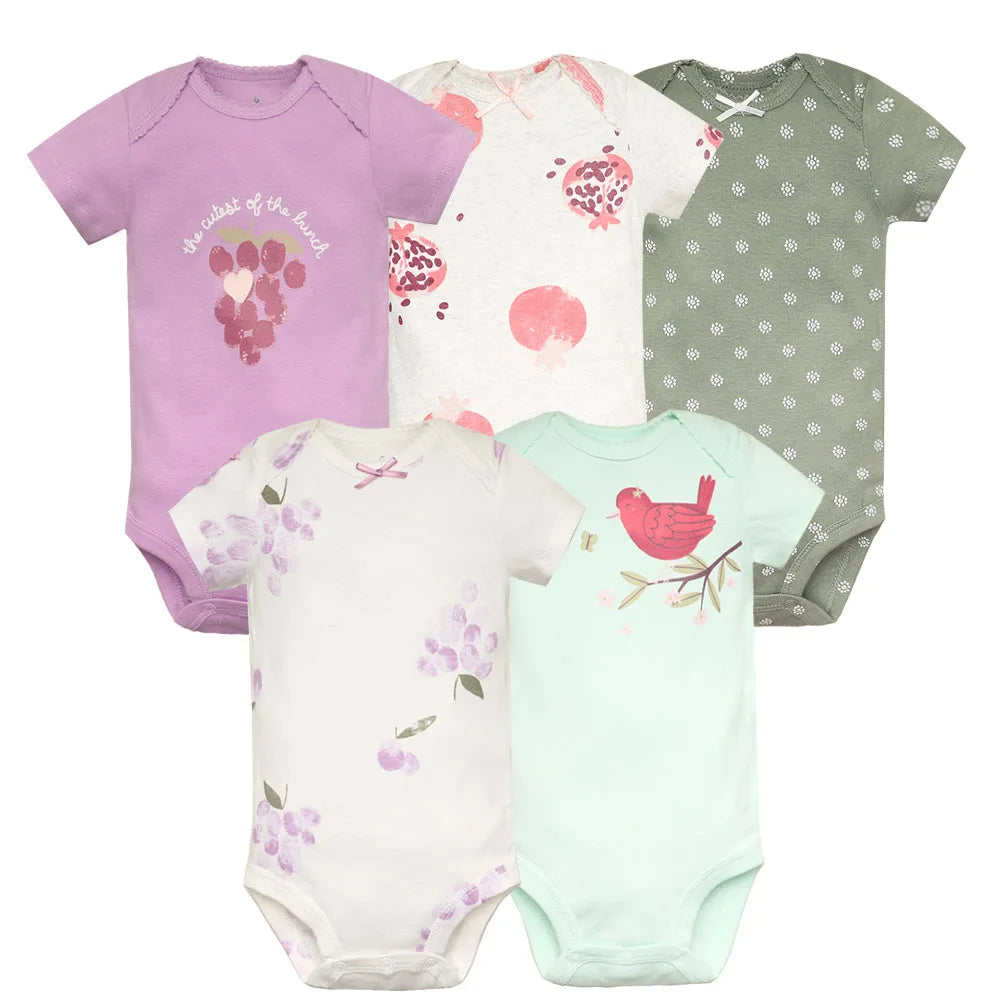 Set of five baby bodysuits with floral, bird, and polka dot patterns