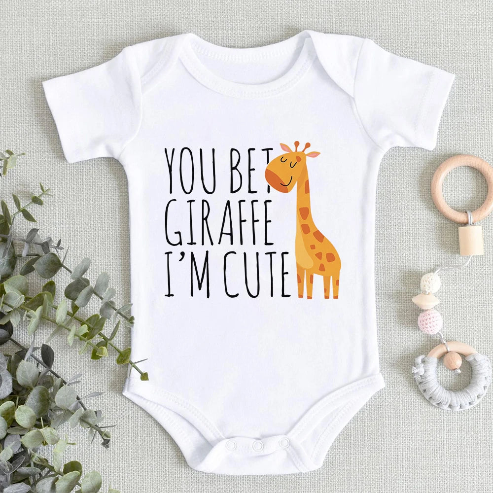 Gorgeous words on a the front of a white baby girl or boy romper suit
