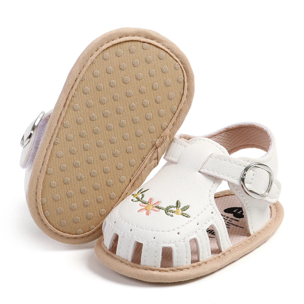 Embroidered flowers are so cute on all pairs of summer sandals