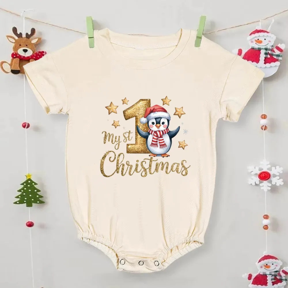 Baby onesie with 'My 1st Christmas' text and penguin design