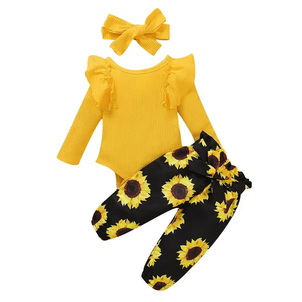 Sunflower print leggings with yellow romper and headband