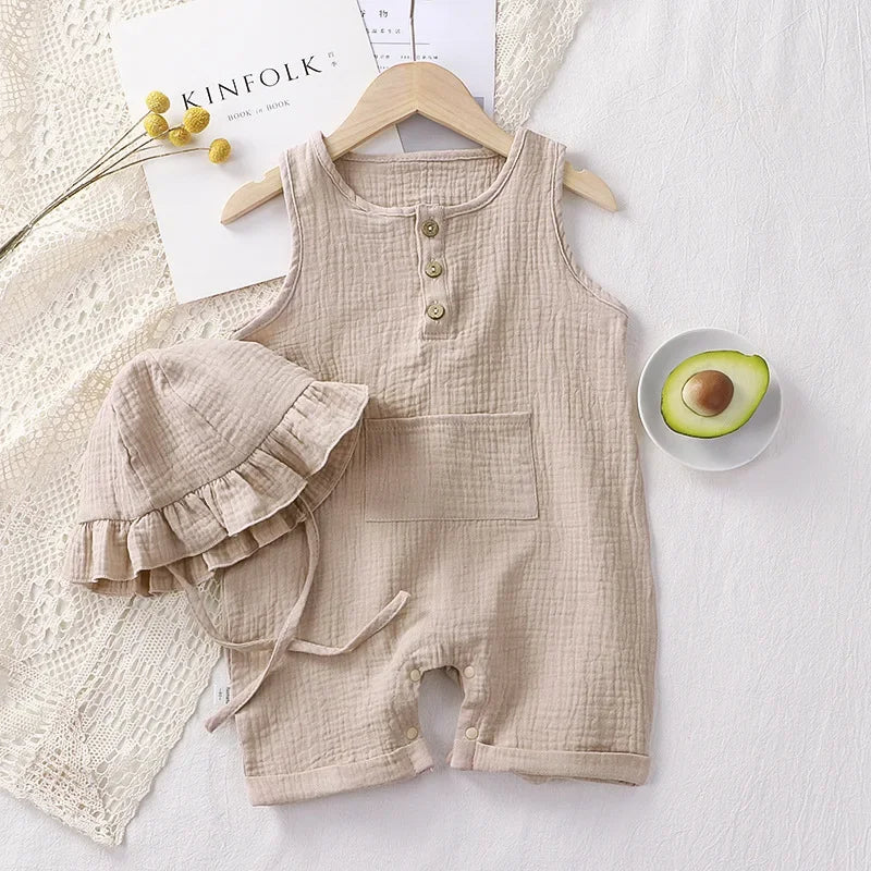 Beige colored romper with matching hat