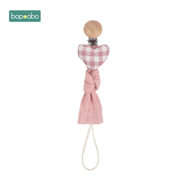 Pink coloured dummy chain clip with a cute heart