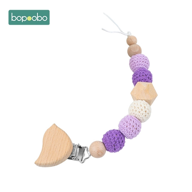 Purple coloured knitted balls dummy chain clip