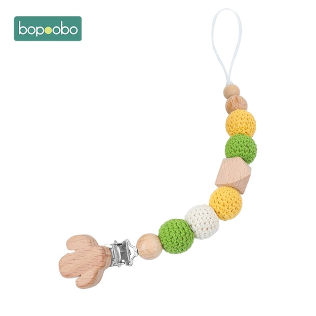 Mixed coloured knitted balls on as dummy chain clip