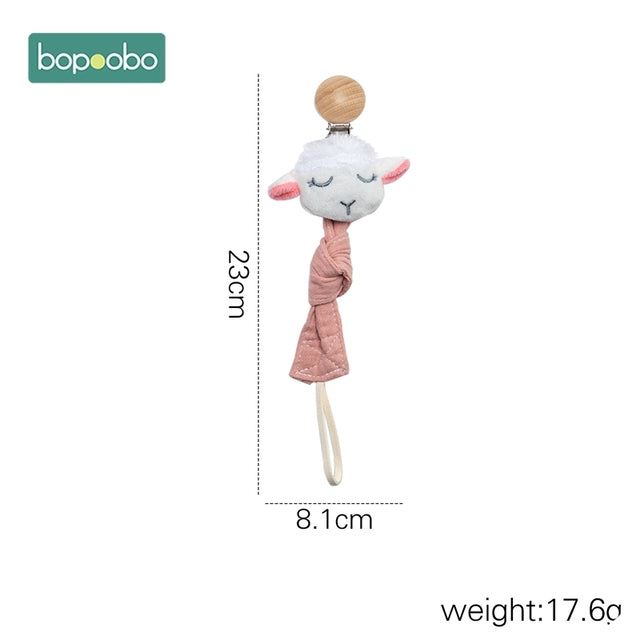 Cute sleepy lamb head on a dummy chain clip