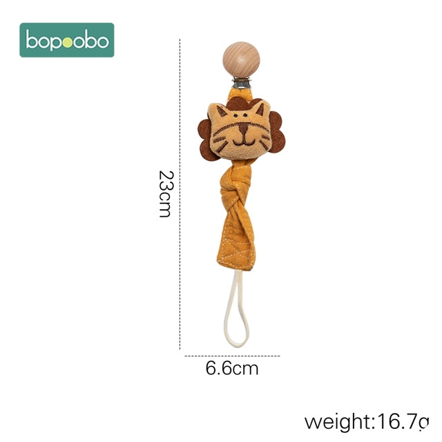 Mustard coloured cloth dummy chain clip with a lion head