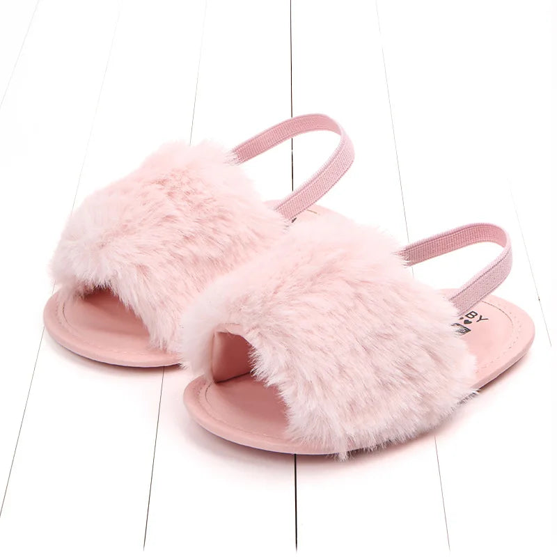 Pink slippers with fluffy fur