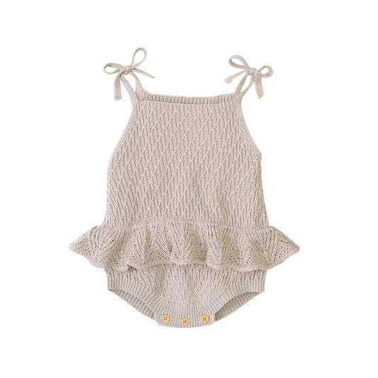 Knitted baby romper with ruffled bottom o