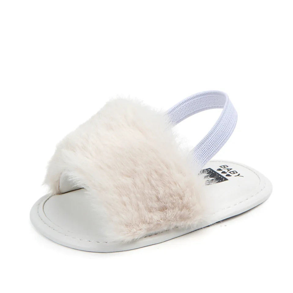 White slipper with fur trim 