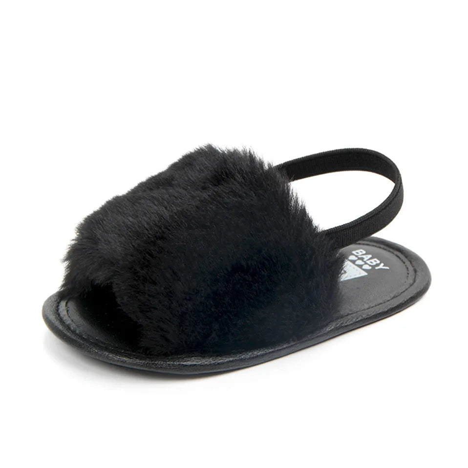 Black fluffy sandal with a strap 
