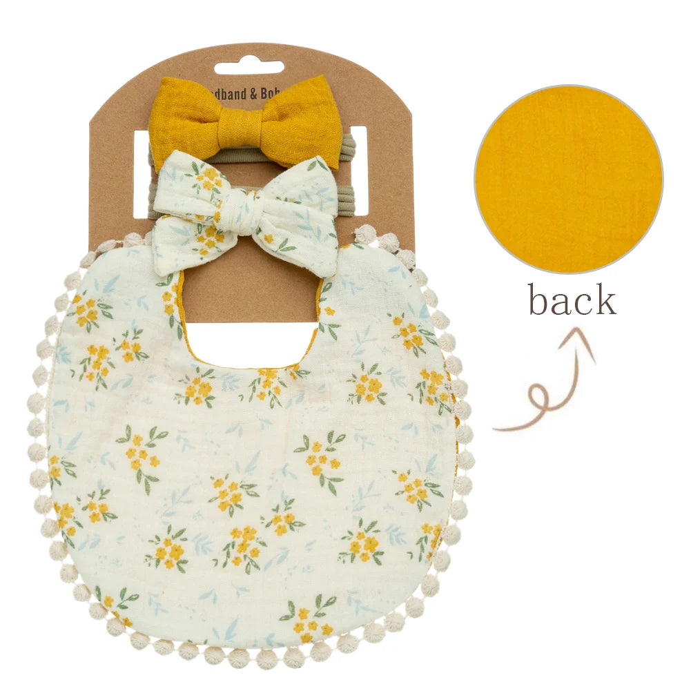 Bright yellow baby girl bib