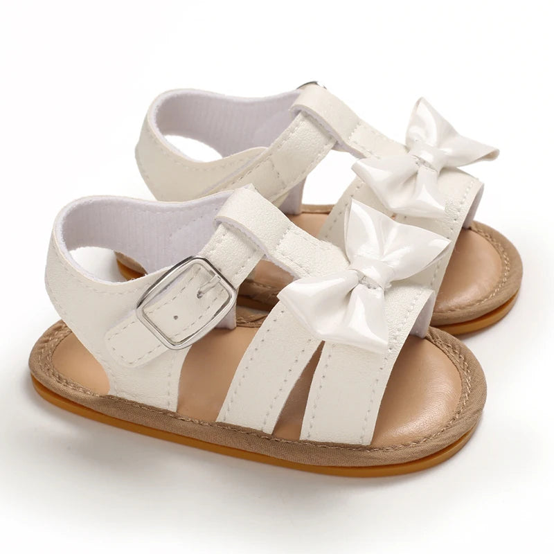 Cute white sandals with a very cute bow