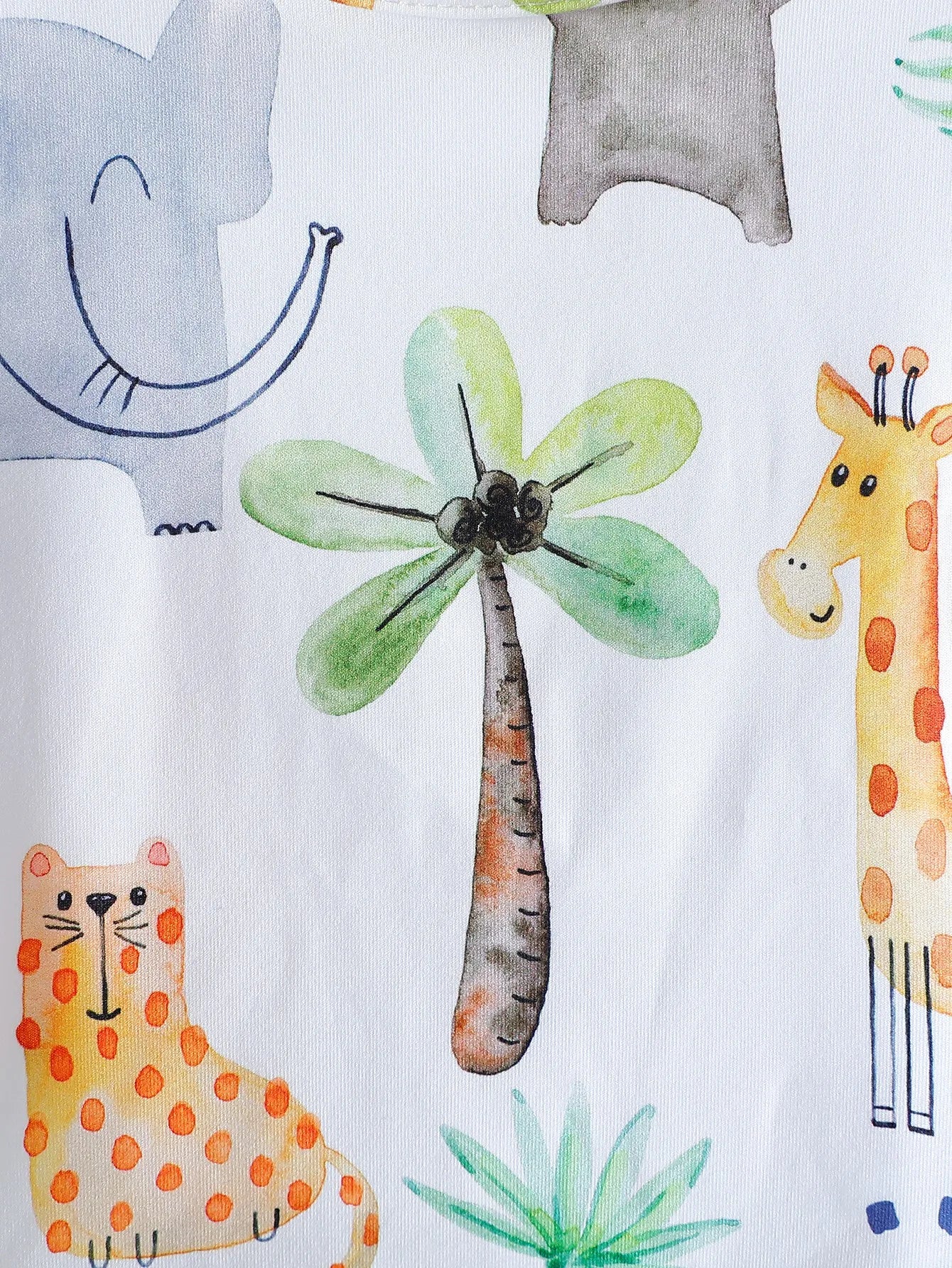 Children's fabric with cartoon animals including a giraffe, elephant, and cat, with a palm tree and leaves.