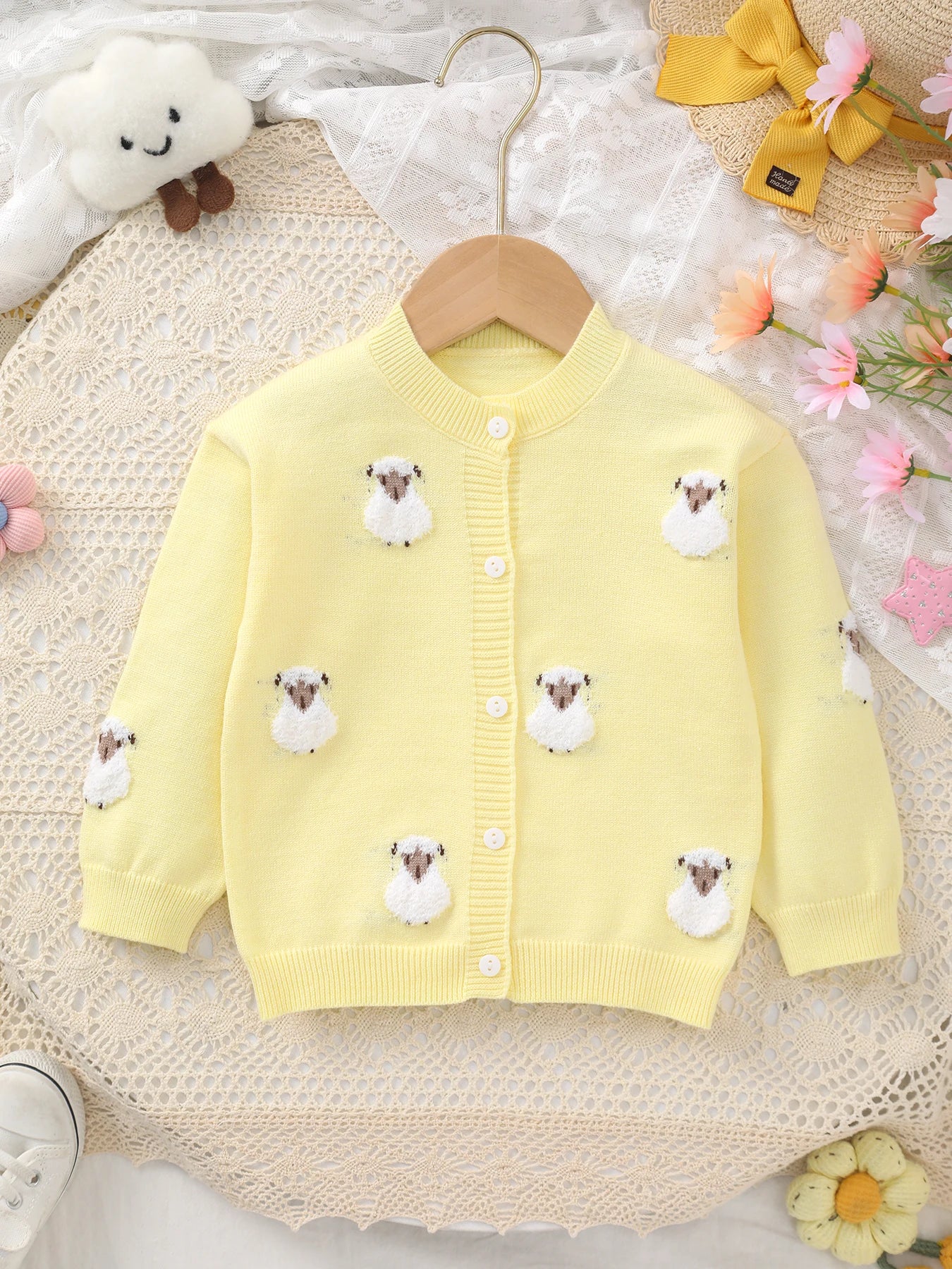Yellow cardigan withsheep