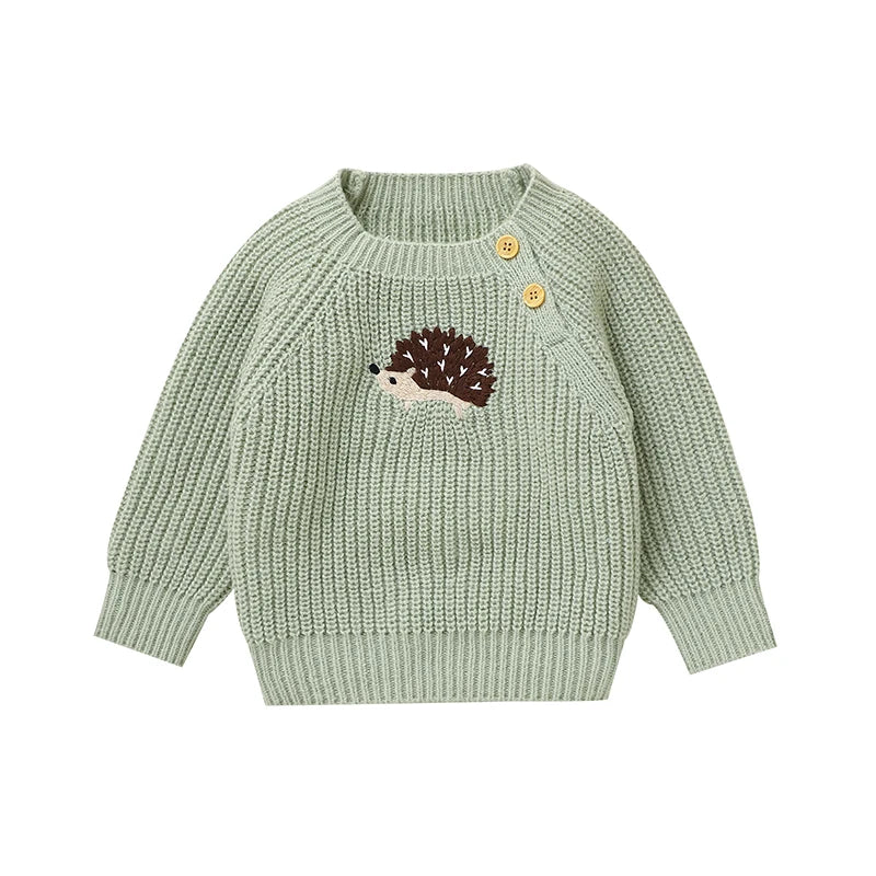 Green knitted sweater with a hedgehog design 