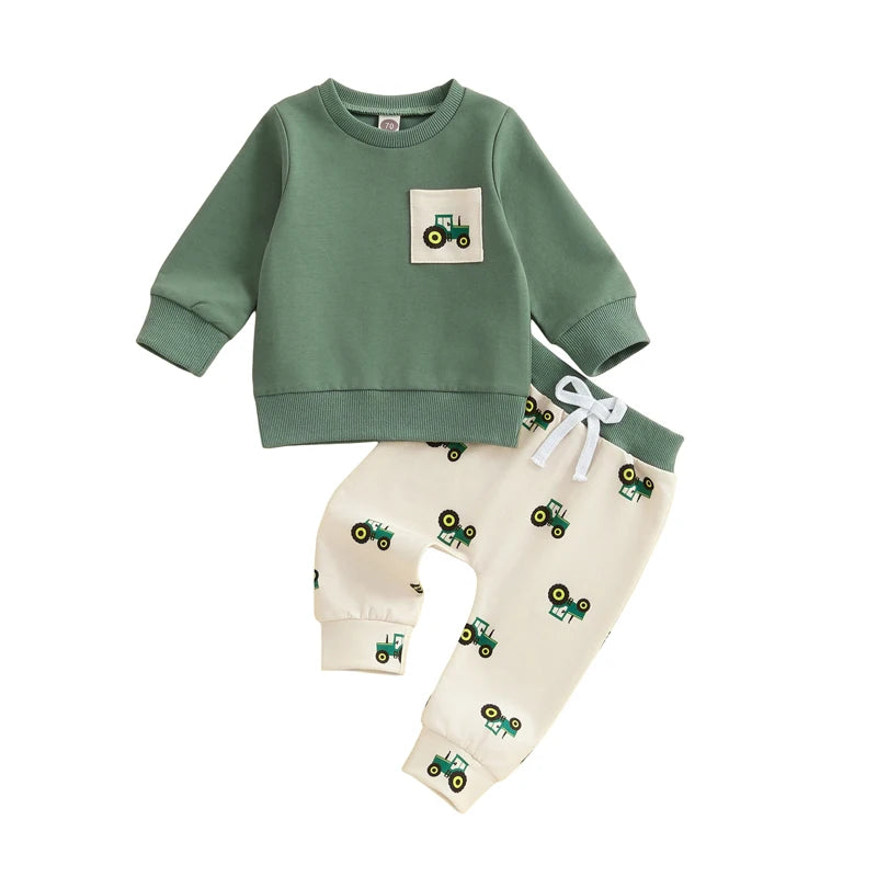 Green sweatshirt and cream pants with tractor pattern 