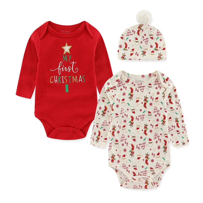 Set of Christmas-themed baby clothing including a red onesie, white onesie with festive patterns, and a matching hat 