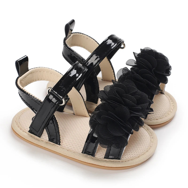 Lovely black shiny sandals with flowers