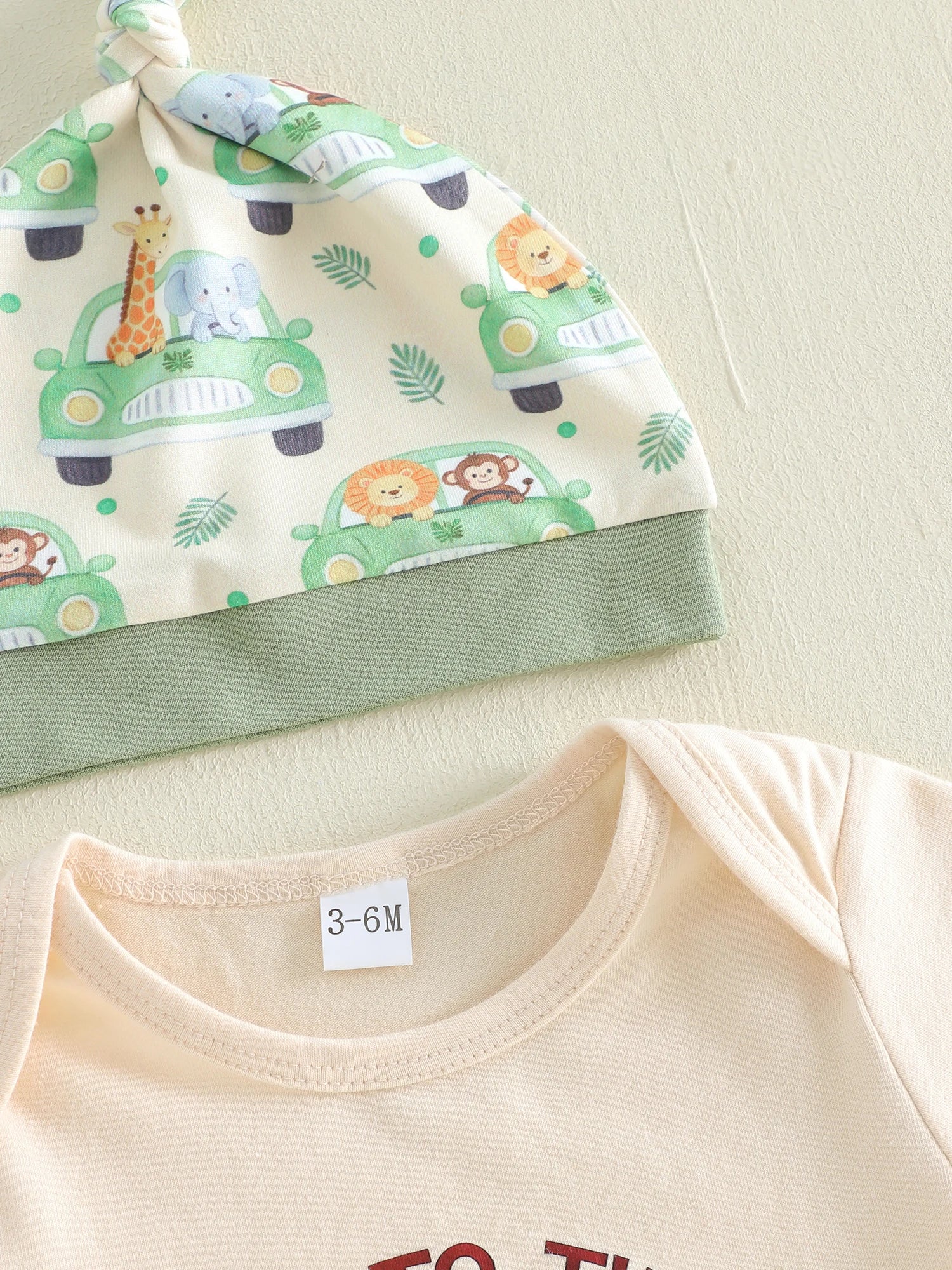 Baby hat with animal and car pattern 