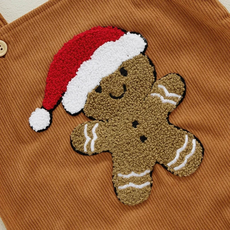 Very very cute gingerbread motif on the front of the baby romper suit