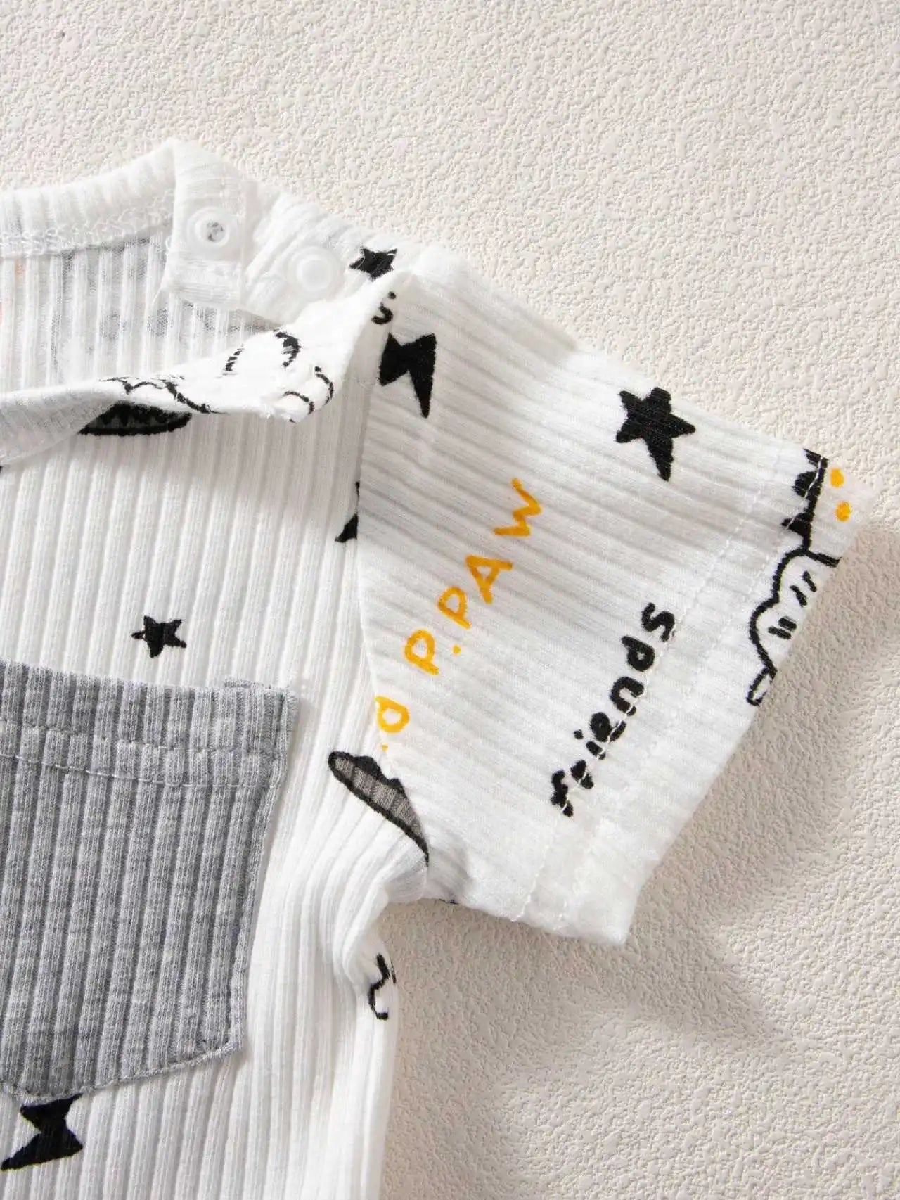 Set of baby socks with star and paw print patterns 