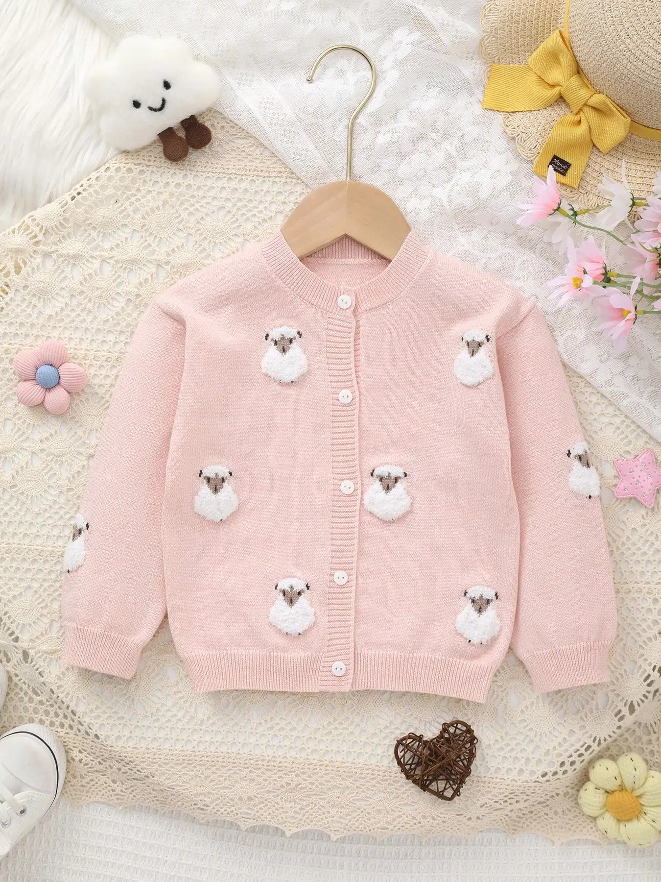 Pink children's cardigan with sheep