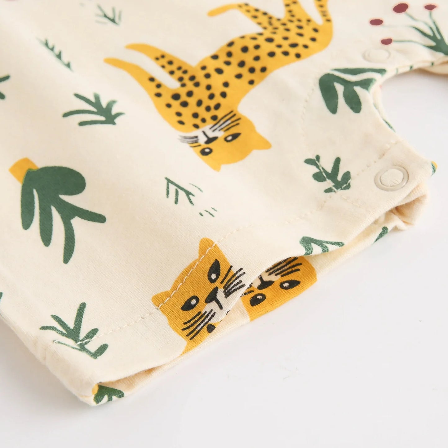 Folded fabric with leopard and leaf pattern 