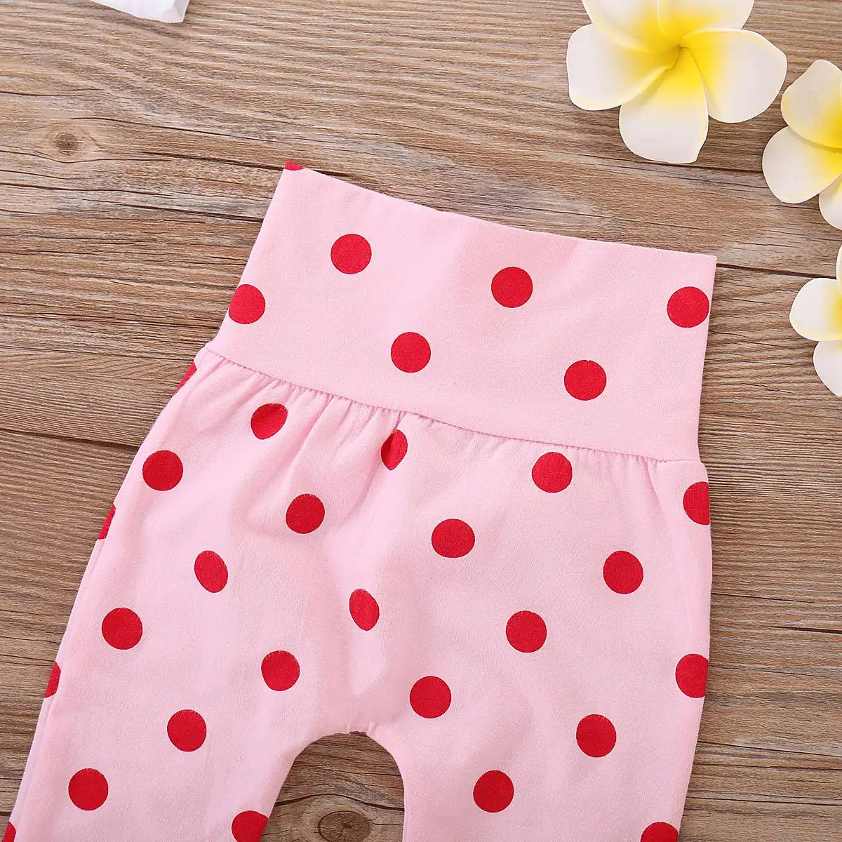 Very large waist band on the baby girl bottoms, makes them more comfortable to wear