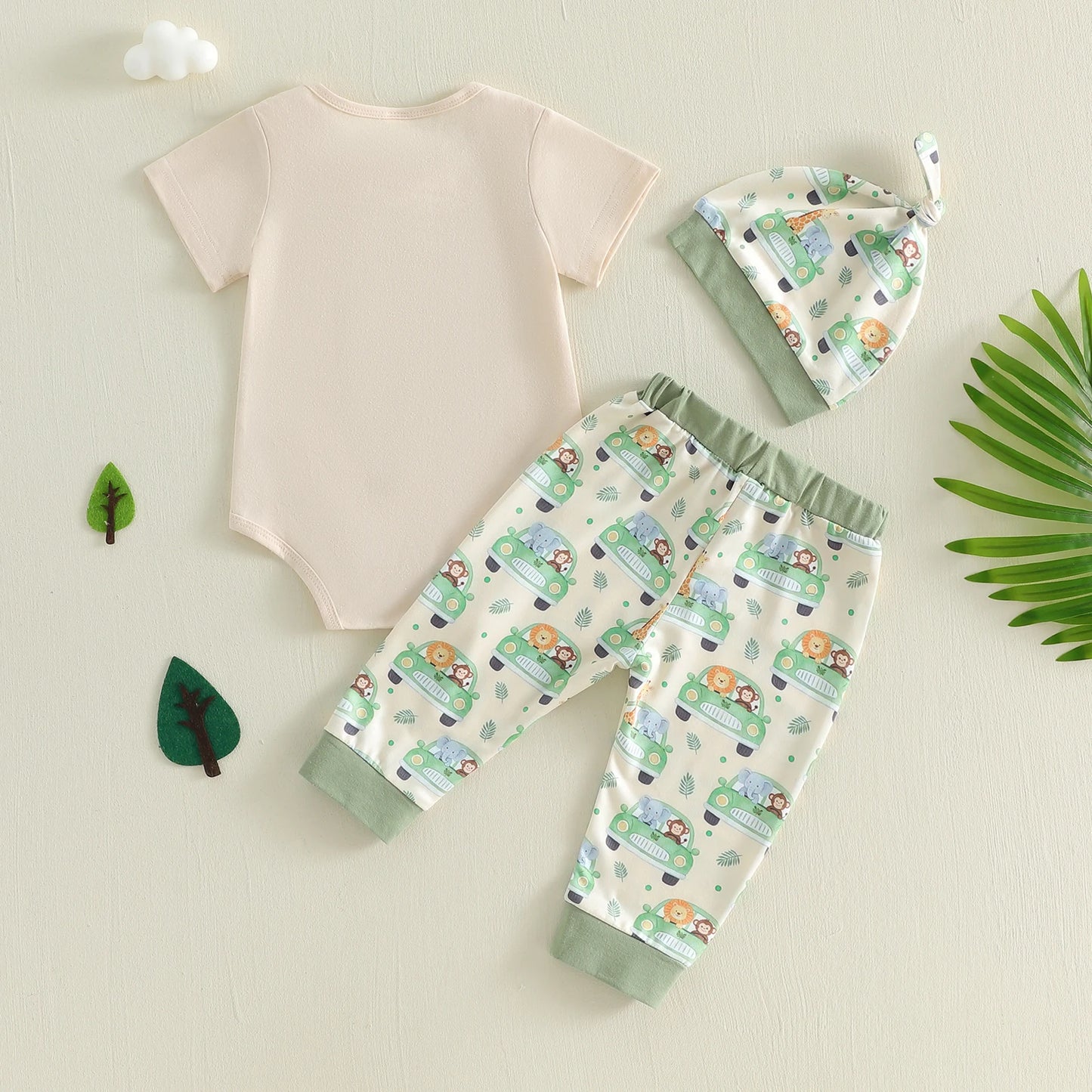 Baby clothing set with onesie, pants, and hat 