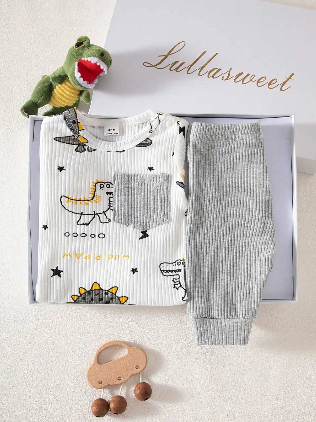 Children's outfit with dinosaur-themed shirt and pants