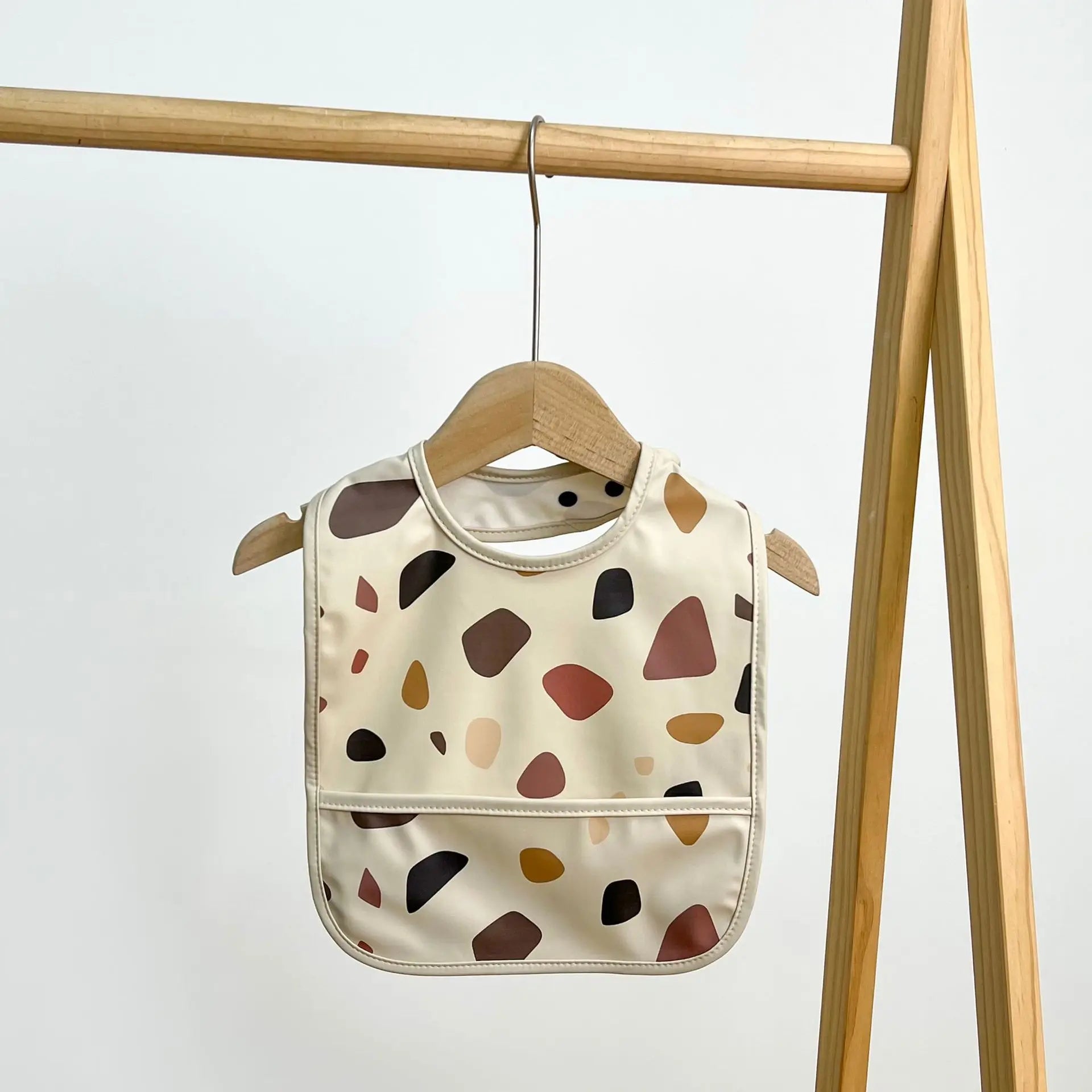 Baby bib with terrazzo pattern 