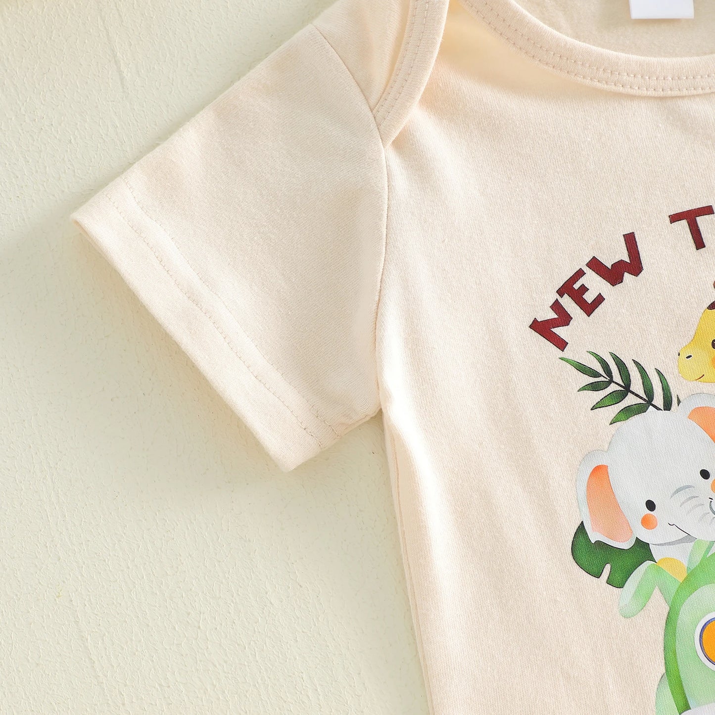 Baby onesie with cartoon characters 