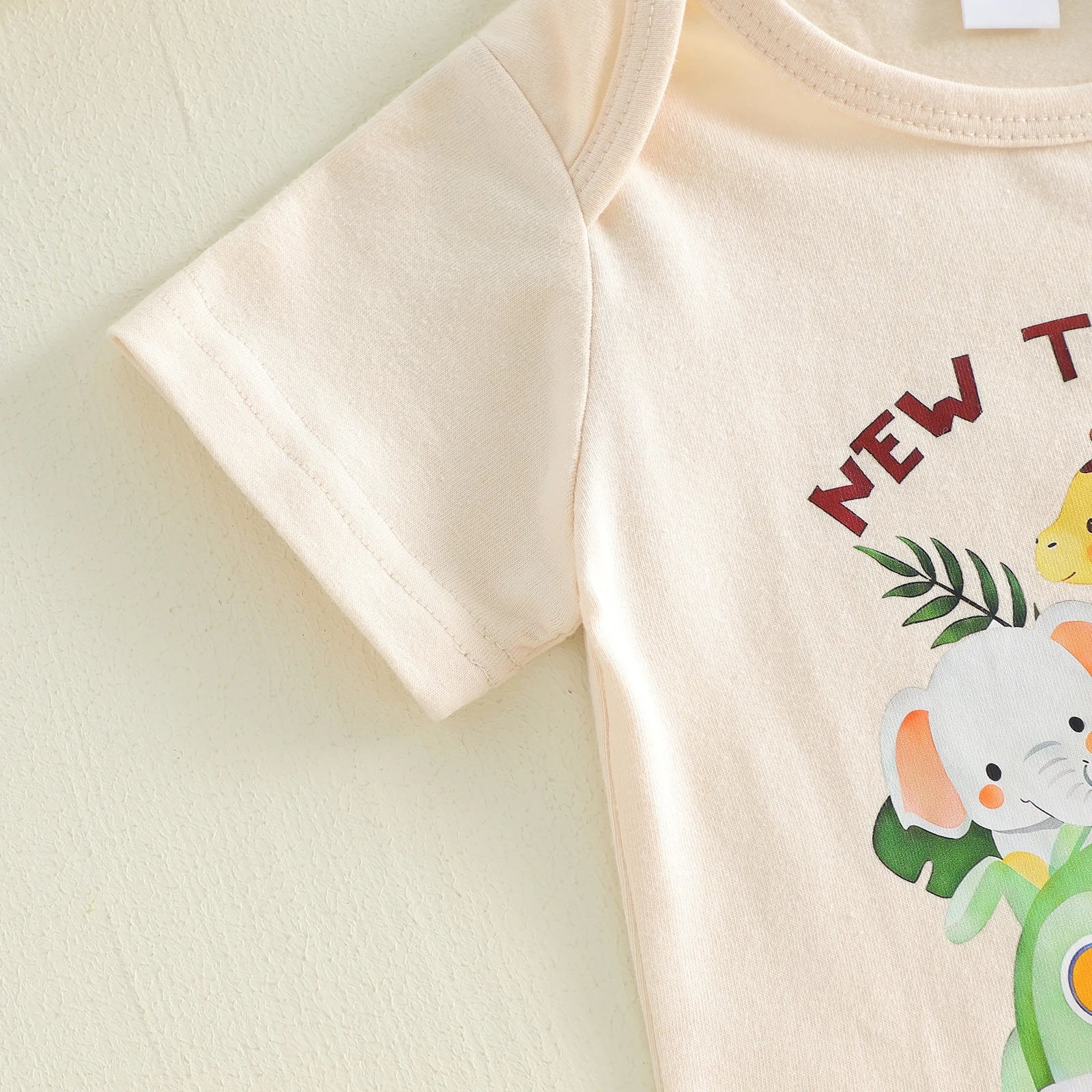 Baby onesie with cartoon characters 