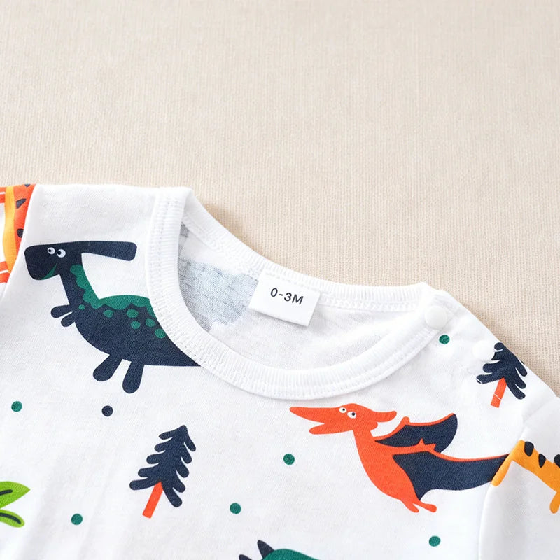 Baby onesie with dinosaur pattern 