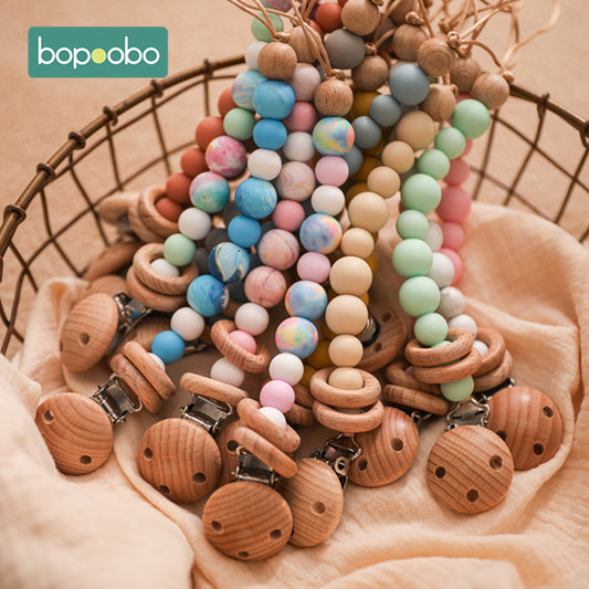 Pacifier silicone beads with a wooden clip